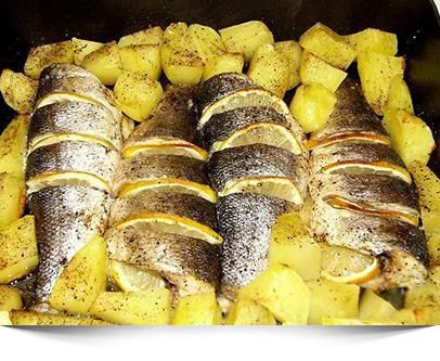 Mesón Puente Viejo pescado al horno con patatas
